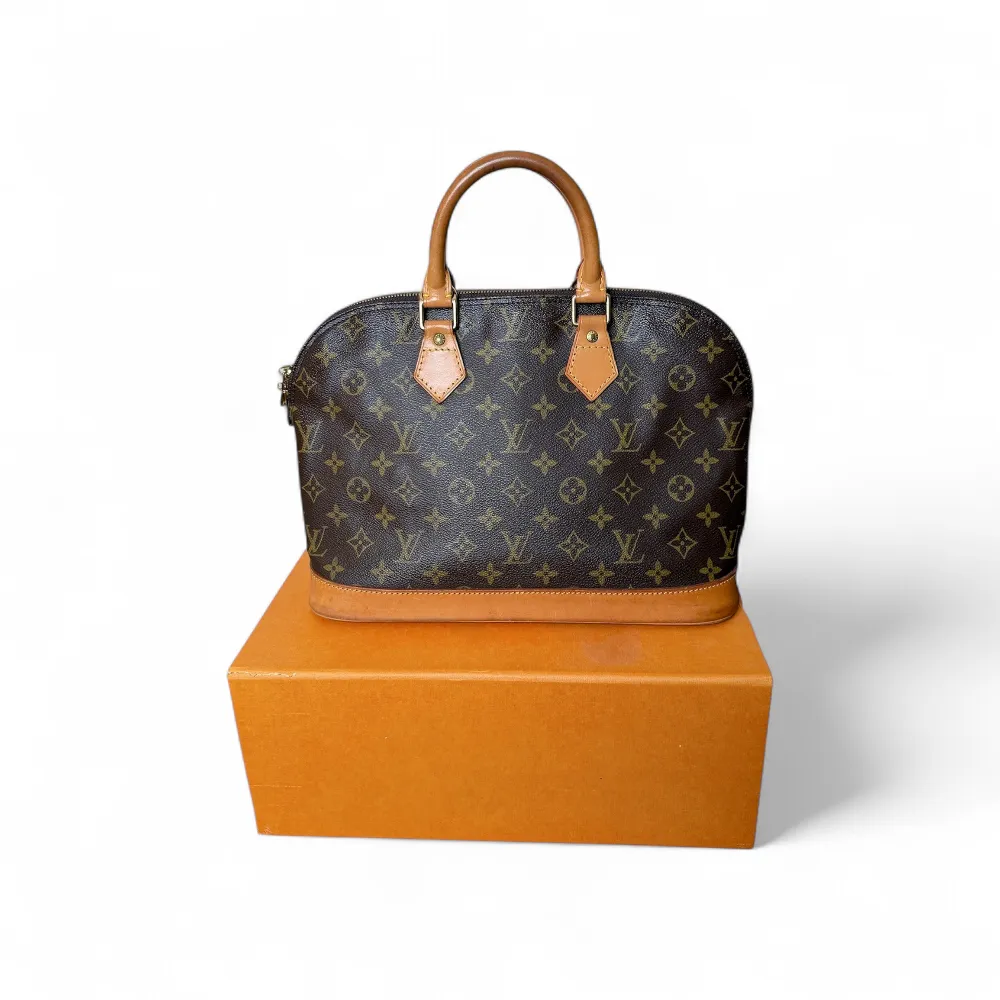 LOUIS VUITTON Alma PM
